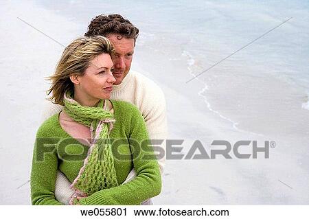 affection, bond, beach, autumn, 30's View Large Photo Image Stock Image - affection, bond, beach, autumn, 30's. Fotosearch