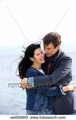 affection, bond, beach, autumn, 30's View Large Photo Image Stock Image - affection, bond, beach, autumn, 30's. Fotosearch