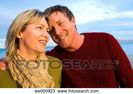 affection, bond, beach, autumn, 30's View Large Photo Image Stock Image - affection, bond, beach, autumn, 30's. Fotosearch