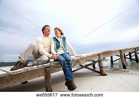 affection, bond, beach, autumn, 30's View Large Photo Image Stock Photo - affection, bond, beach, autumn, 30's. Fotosearch