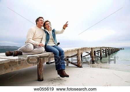 affection, bond, beach, autumn, 30's View Large Photo Image Stock Photo - affection, bond, beach, autumn, 30's. Fotosearch