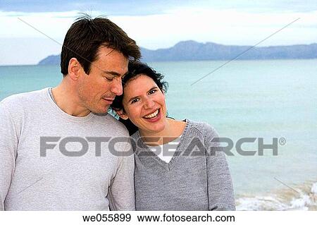 affection, bond, beach, autumn, 30's View Large Photo Image Stock Photo - affection, bond, beach, autumn, 30's. Fotosearch