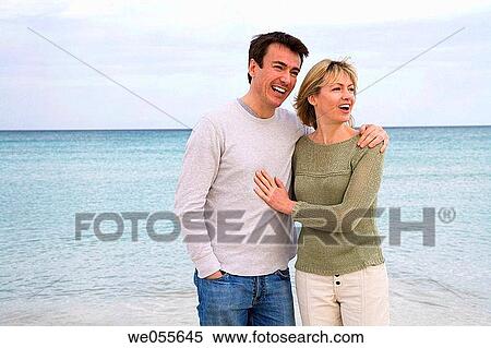 Stock Photography - affection, bond, beach, autumn, 30's. Fotosearch