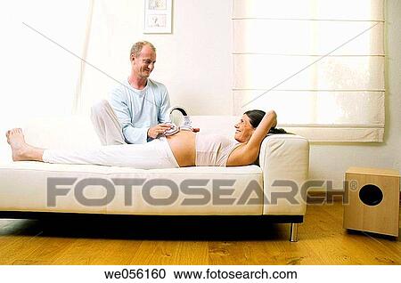 affection, bond, belly, at-home, 30's View Large Photo Image Stock Image - affection, bond, belly, at-home, 30's. Fotosearch