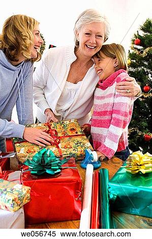Stock Photography - affection, bonding, bond, at-home, 3 generations. Fotosearch