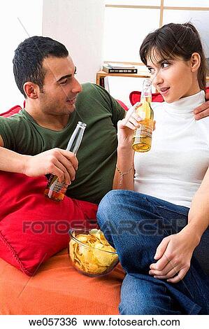 Stock Photograph - Alcoholic drink, beer, attraction, at-home, alcohol. Fotosearch