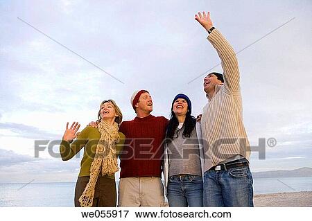 amusement, autumn, Arms raised, 30's View Large Photo Image Stock Photo - amusement, autumn, Arms raised, 30's. Fotosearch