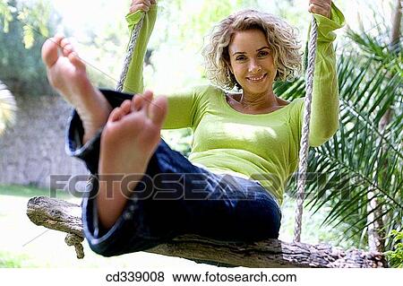 amusement, blond, barefoot, baby boomer, 20 View Large Photo Image Stock Photo - amusement, blond, barefoot, baby boomer, 20. Fotosearch
