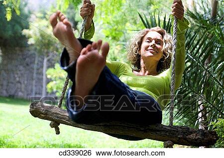 amusement, blond, barefoot, baby boomer, 20 View Large Photo Image Stock Photograph - amusement, blond, barefoot, baby boomer, 20. Fotosearch