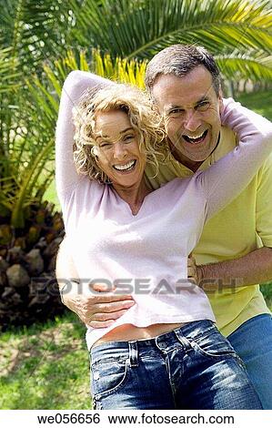 Stock Photograph - amusement, bonding, bond, baby boomer, affection. Fotosearch