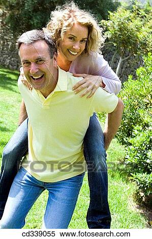 amusement, bonding, bond, baby boomer, affection View Large Photo Image Stock Photography - amusement, bonding, bond, baby boomer, affection. Fotosearch