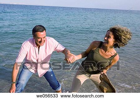 amusement, carefree, beach, baby boomer, activity View Large Photo Image Stock Image - amusement, carefree, beach, baby boomer, activity. Fotosearch