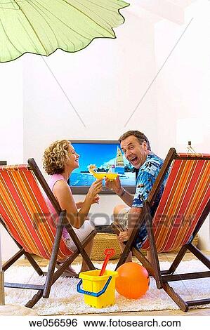 amusing, beach, baby boomer, at-home, amusement View Large Photo Image Stock Photograph - amusing, beach, baby boomer, at-home, amusement. Fotosearch