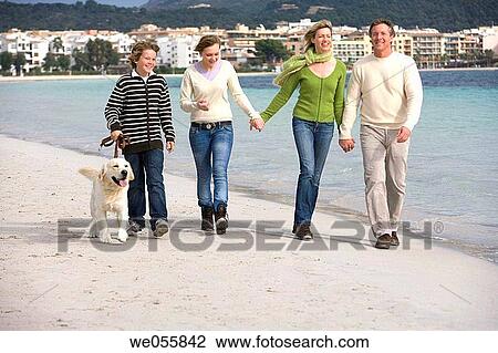 animal, boy, beach, 30's View Large Photo Image Stock Image - animal, boy, beach, 30's. Fotosearch