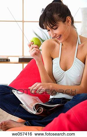 armchair, browse, barefoot, at-home, apple View Large Photo Image Stock Photograph - armchair, browse, barefoot, at-home, apple. Fotosearch