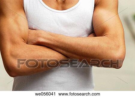 Arms crossed, detail, contemporary, arm View Large Photo Image Stock Image - Arms crossed, detail, contemporary, arm. Fotosearch