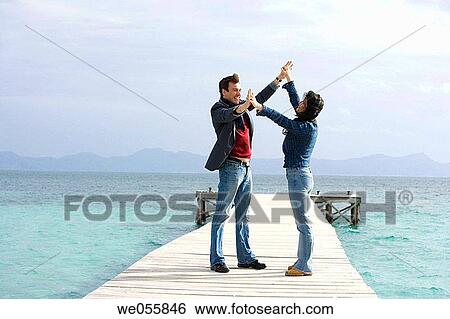 Arms open, bonding, bond, Arms raised, 30's View Large Photo Image Stock Photograph - Arms open, bonding, bond, Arms raised, 30's. Fotosearch