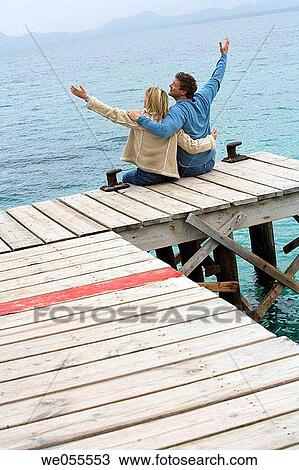 Arms raised, bonding, bond, back view, Arms open View Large Photo Image Stock Image - Arms raised, bonding, bond, back view, Arms open. Fotosearch