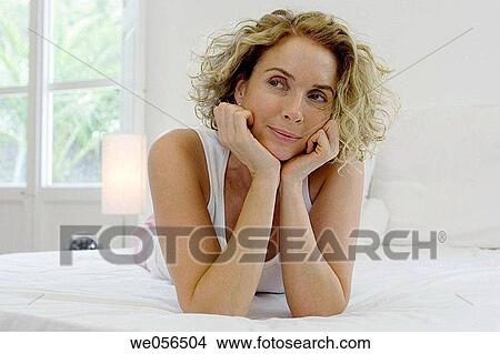 askance, baby boomer, at-home, absorbed View Large Photo Image Picture - askance, baby boomer, at-home, absorbed. Fotosearch