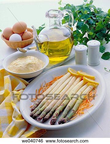 Stock Photograph - Asparagus with mayonnaise. Fotosearch