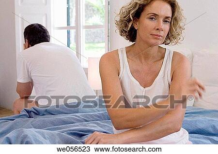 at-home, bedroom, bed, baby boomer, absorbed View Large Photo Image Stock Image - at-home, bedroom, bed, baby boomer, absorbed. Fotosearch