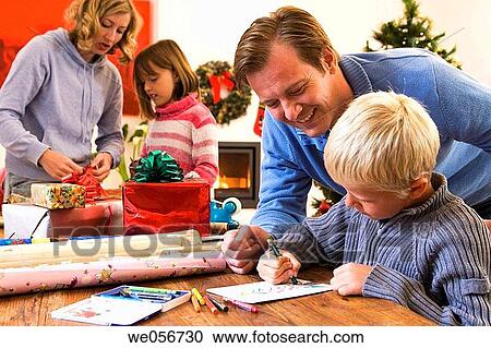 Stock Image - at-home, boy, affection. Fotosearch