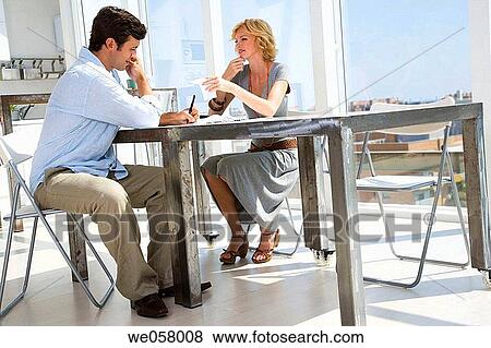 Stock Photo - at-home, calculating, calculate, bill, absorbed. Fotosearch