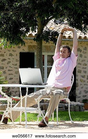 at-home, calm, baby boomer, Arms raised View Large Photo Image Stock Photo - at-home, calm, baby boomer, Arms raised. Fotosearch