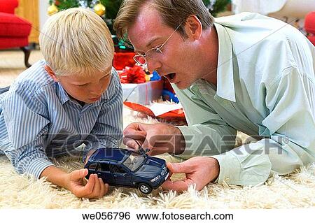 at-home, car, boy, automobile, admiration View Large Photo Image Stock Photograph - at-home, car, boy, automobile, admiration. Fotosearch