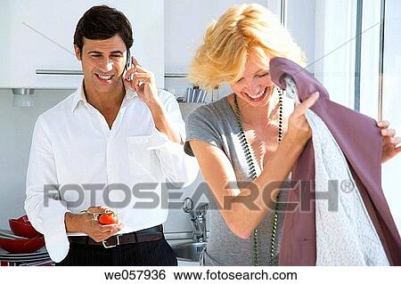 at-home, cell phone, calling, absorbed View Large Photo Image Stock Photograph - at-home, cell phone, calling, absorbed. Fotosearch