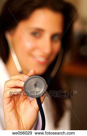 auscultate, brunette, auscultation, 30's View Large Photo Image Stock Photo - auscultate, brunette, auscultation, 30's. Fotosearch