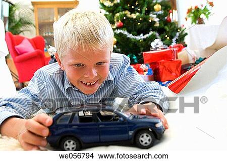 automobile, car, boy, blond, at-home View Large Photo Image Picture - automobile, car, boy, blond, at-home. Fotosearch