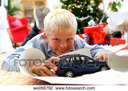 automobile, car, boy, blond, at-home View Large Photo Image Stock Image - automobile, car, boy, blond, at-home. Fotosearch