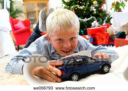 automobile, car, boy, blond, at-home View Large Photo Image Stock Image - automobile, car, boy, blond, at-home. Fotosearch