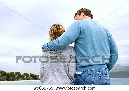 Stock Photography - autumn, bond, beach, back view, 30's. Fotosearch