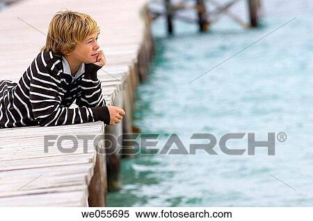 autumn, calm, boy, blond, absorbed View Large Photo Image Stock Photography - autumn, calm, boy, blond, absorbed. Fotosearch