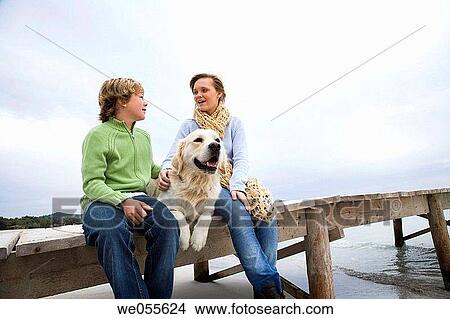 autumn, calm, brother, boy, animal View Large Photo Image Picture - autumn, calm, brother, boy, animal. Fotosearch