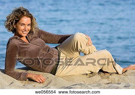 baby boomer, barefoot, beach, break, break-time View Large Photo Image Picture - baby boomer, barefoot, beach, break, break-time. Fotosearch