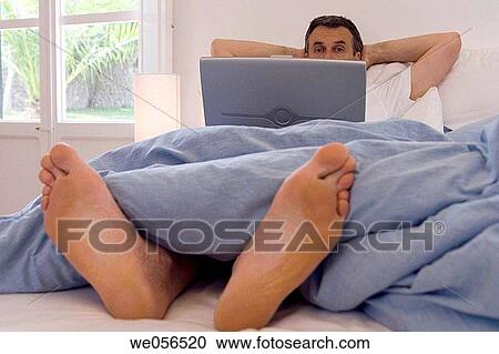 baby boomer, bedroom, bed, barefoot, at-home View Large Photo Image Stock Image - baby boomer, bedroom, bed, barefoot, at-home. Fotosearch
