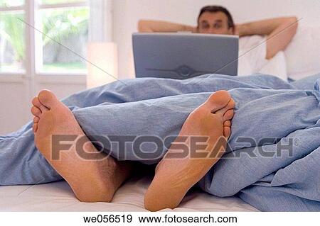 baby boomer, bedroom, bed, barefoot, at-home View Large Photo Image Stock Photo - baby boomer, bedroom, bed, barefoot, at-home. Fotosearch
