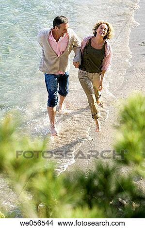baby boomer, bond, beach, barefoot, amusement View Large Photo Image Picture - baby boomer, bond, beach, barefoot, amusement. Fotosearch