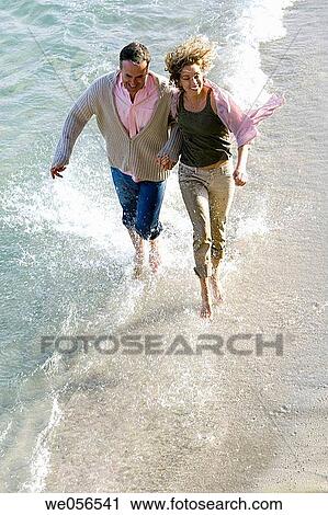 baby boomer, bond, beach, barefoot, amusement View Large Photo Image Stock Image - baby boomer, bond, beach, barefoot, amusement. Fotosearch