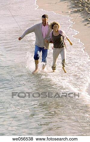 baby boomer, bond, beach, barefoot, amusement View Large Photo Image Stock Photo - baby boomer, bond, beach, barefoot, amusement. Fotosearch