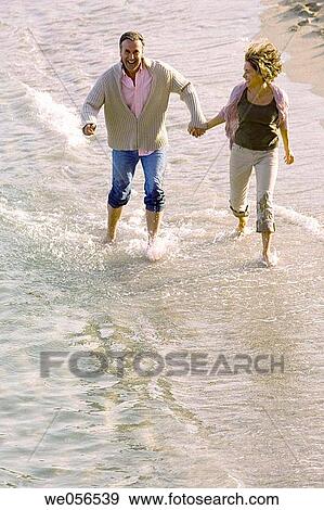 baby boomer, bond, beach, barefoot, amusement View Large Photo Image Stock Photo - baby boomer, bond, beach, barefoot, amusement. Fotosearch