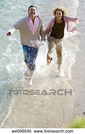 baby boomer, bond, beach, barefoot, amusement View Large Photo Image Stock Photography - baby boomer, bond, beach, barefoot, amusement. Fotosearch