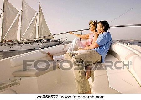 Stock Image - baby boomer, bond, boat, barefoot, amusement. Fotosearch
