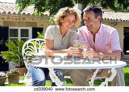 Stock Image - baby boomer, bonding, bond, at-home. Fotosearch