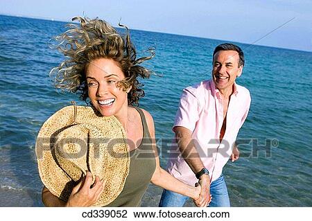baby boomer, bonding, bond, beach, activity View Large Photo Image Stock Image - baby boomer, bonding, bond, beach, activity. Fotosearch