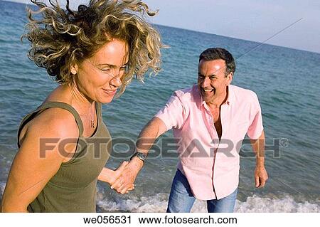 baby boomer, bonding, bond, beach, amusement View Large Photo Image Stock Image - baby boomer, bonding, bond, beach, amusement. Fotosearch