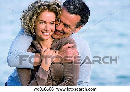 Stock Photograph - baby boomer, bonding, bond, beach, affection. Fotosearch